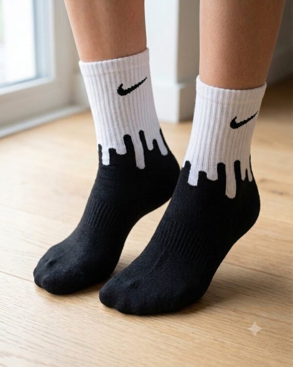 Tenis Nike mancha negra
